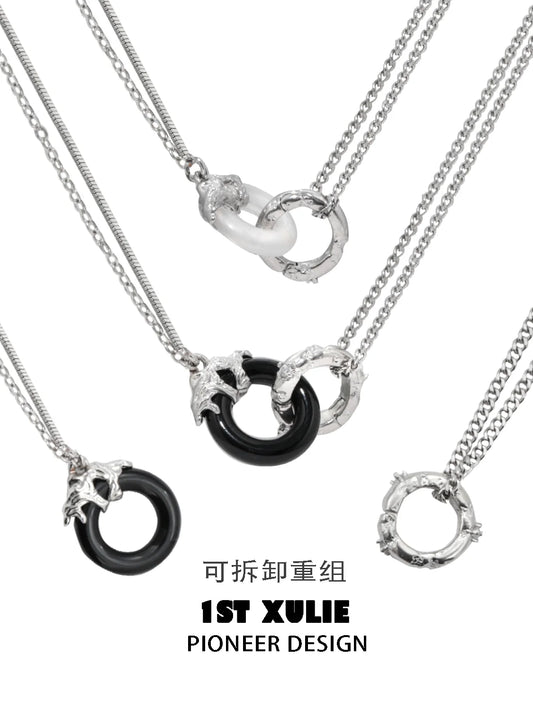 1ST XULIE black and white gothic necklace featuring interlocking rings and chain details