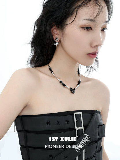 Stylish black cat necklace by 1ST XULIE paired with matching earrings, showcasing a unique design