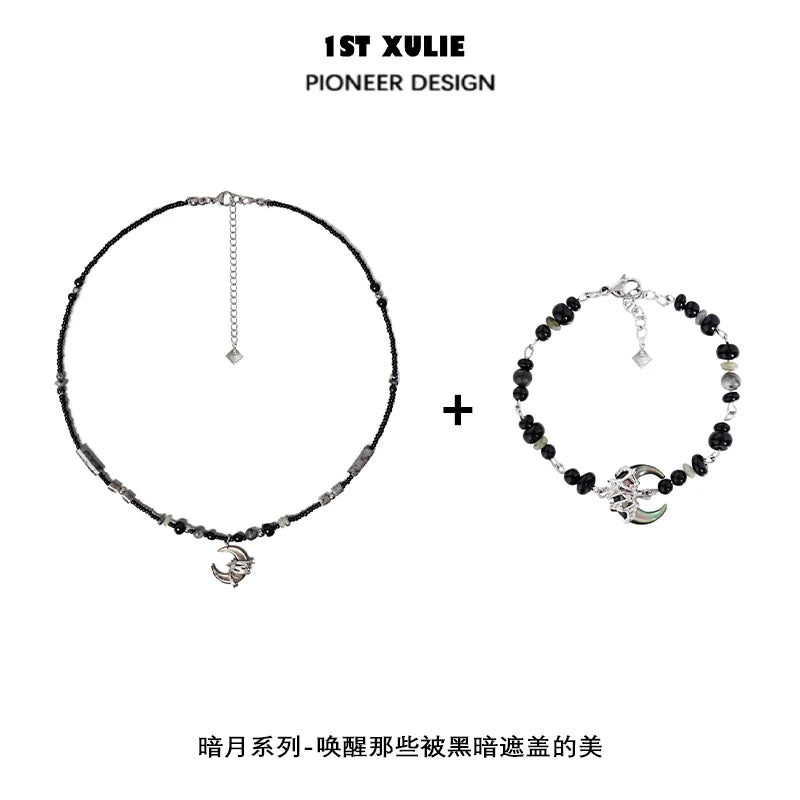 1ST XULIE black moon agate necklace featuring elegant beads and a crescent moon charm
