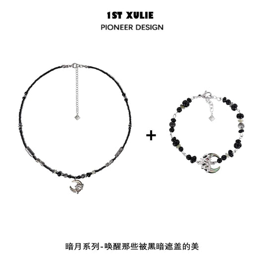 1ST XULIE black moon agate necklace featuring elegant beads and a crescent moon charm