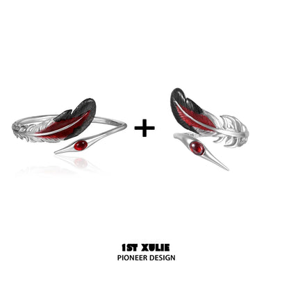 1STXULIE bloody feather bracelet in silver with red accents and a unique feather design