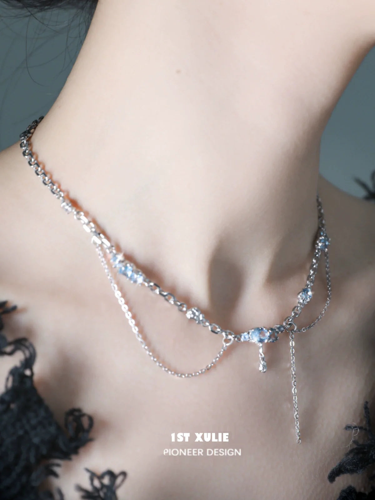 Elegant blue fringe zircon necklace on a silver chain, perfect for stylish occasions