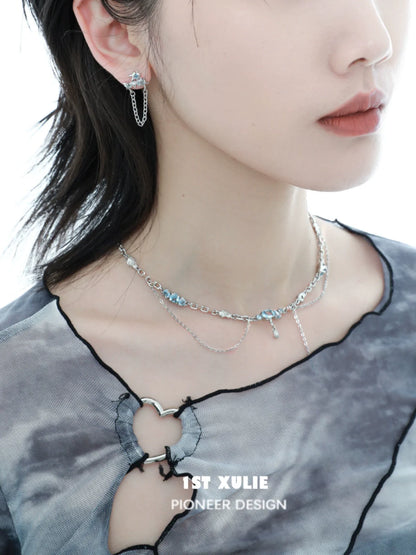 Stylish blue fringe zircon necklace paired with matching earrings for a trendy look