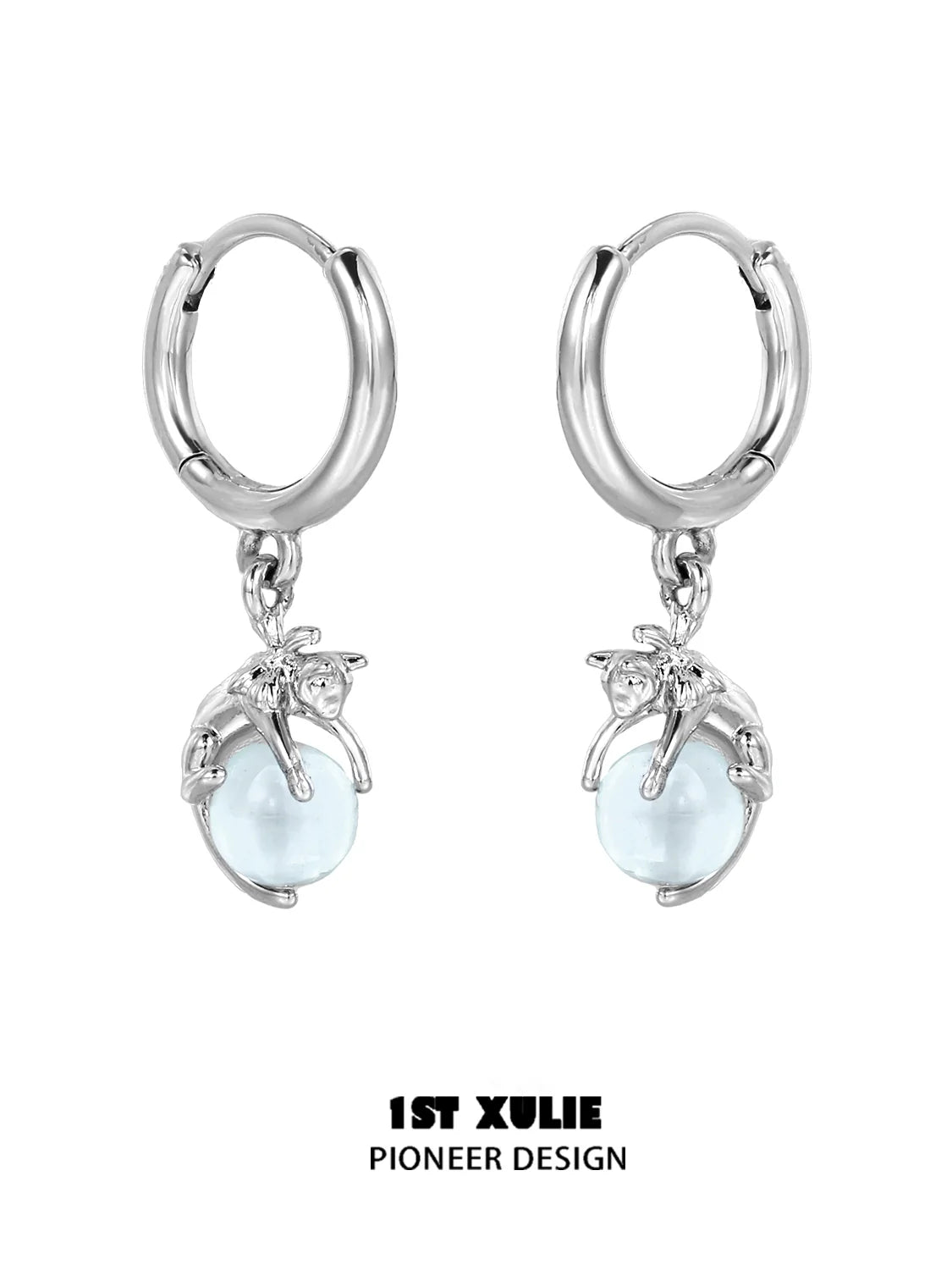 Silver blue kitten hoop earrings featuring playful kitten design and light blue beads