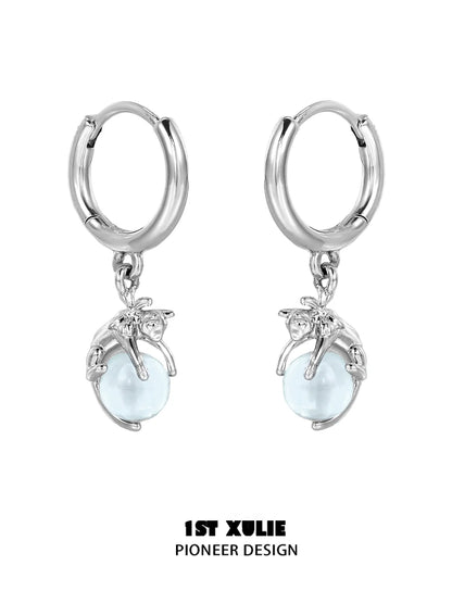Silver blue kitten hoop earrings featuring playful kitten design and light blue beads
