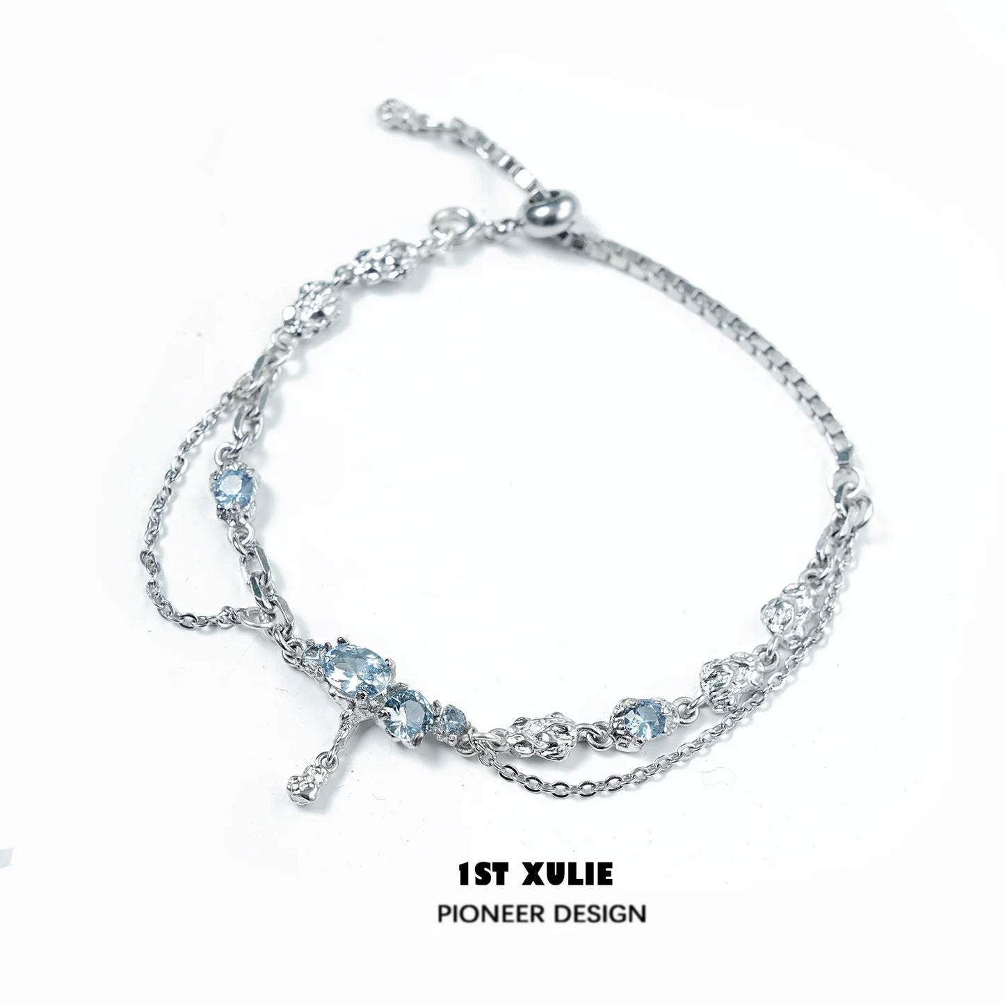 Elegant blue moonstone bracelet with silver chain, featuring multiple shimmering stones