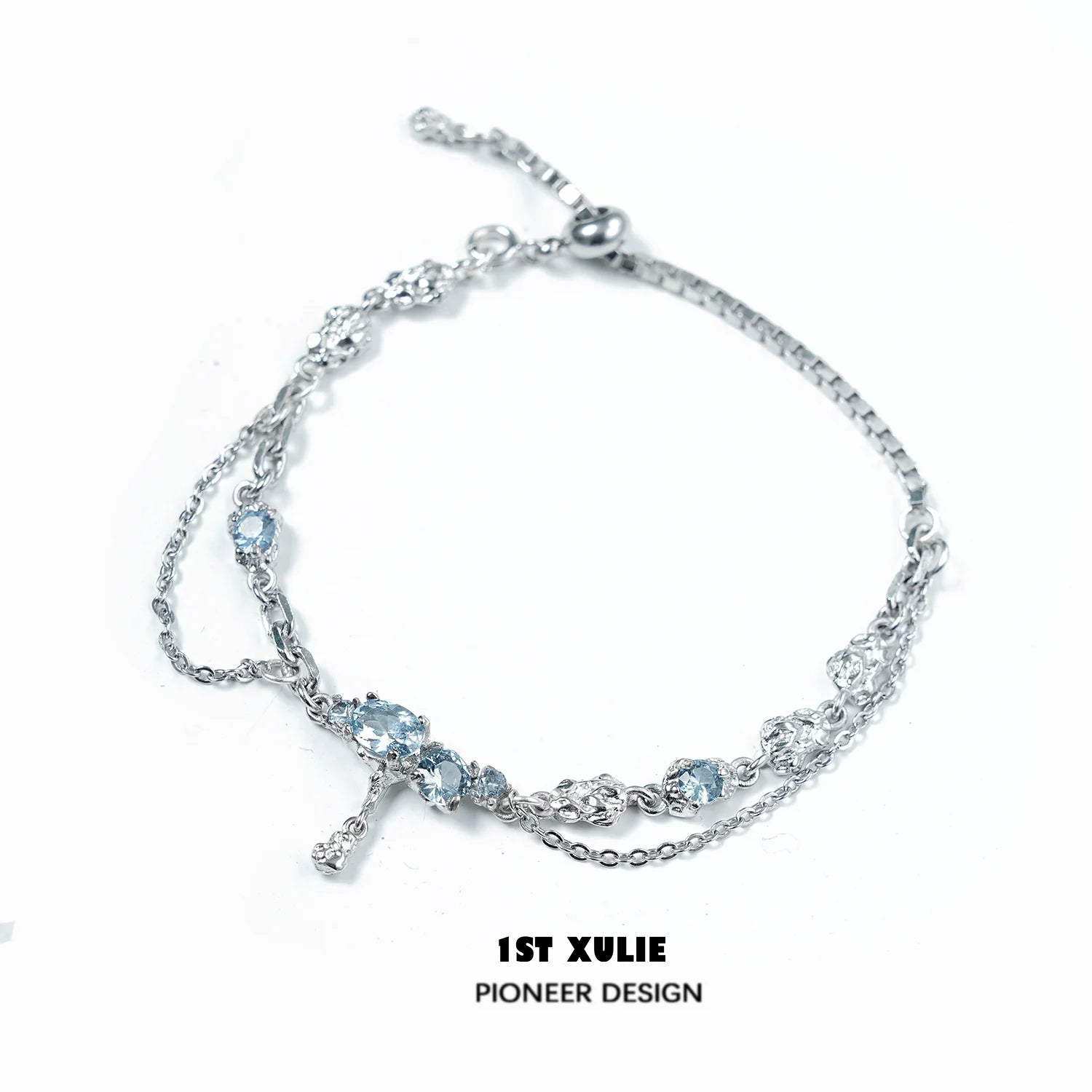 Elegant blue moonstone bracelet with silver chain, featuring multiple shimmering stones