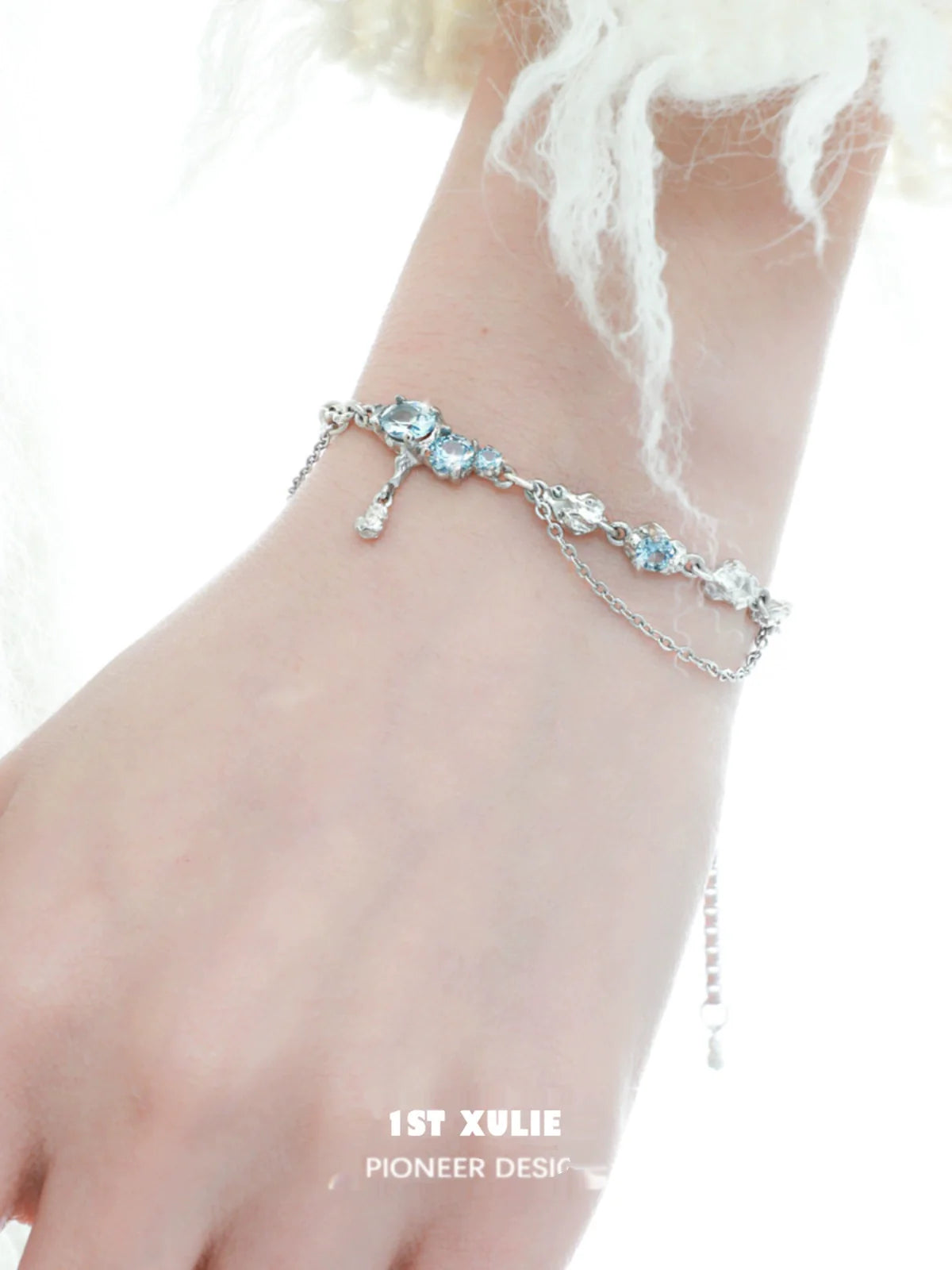Elegant blue moonstone bracelet with silver accents, perfect for adding a touch of sophistication