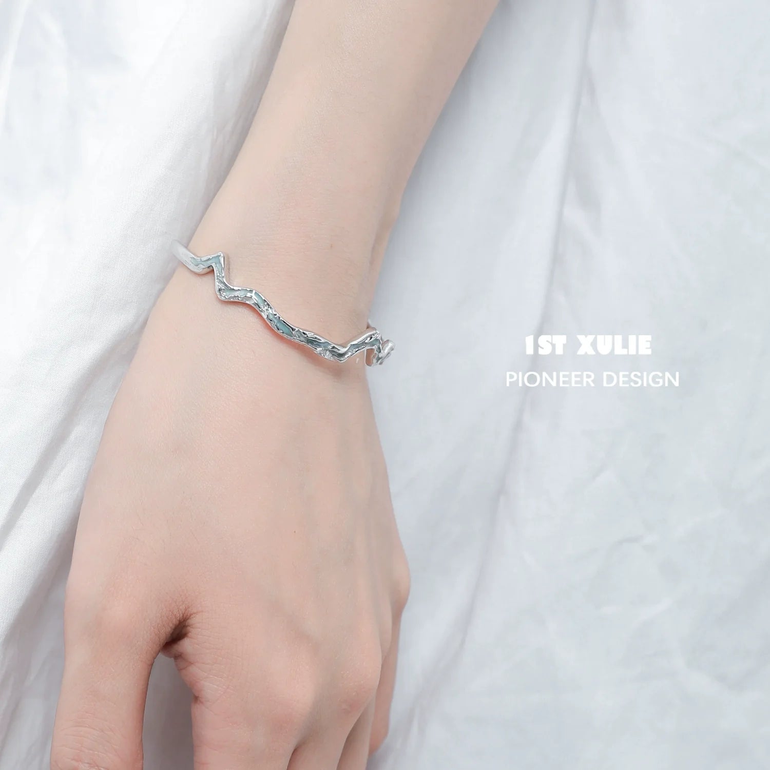 Stylish blue ocean spirit silver bracelet featuring a wave-inspired design for modern accessories