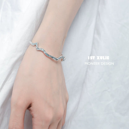Stylish blue ocean spirit silver bracelet featuring a wave-inspired design for modern accessories