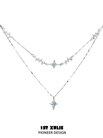 Elegant blue starry sky necklace featuring layered design with star charms and sparkling accents