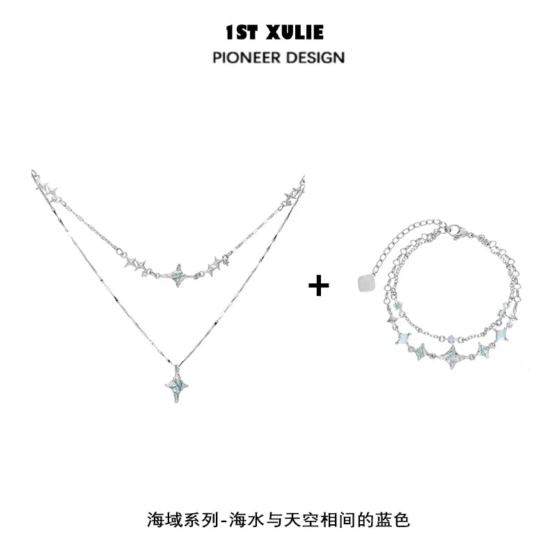 Blue starry sky necklace layered design with shimmering stars and a matching bracelet from 1ST XULIE