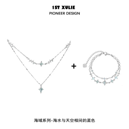 Blue starry sky necklace layered design with shimmering stars and a matching bracelet from 1ST XULIE