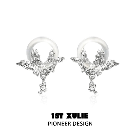 Butterfly chalcedony earrings with intricate silver design for elegant style