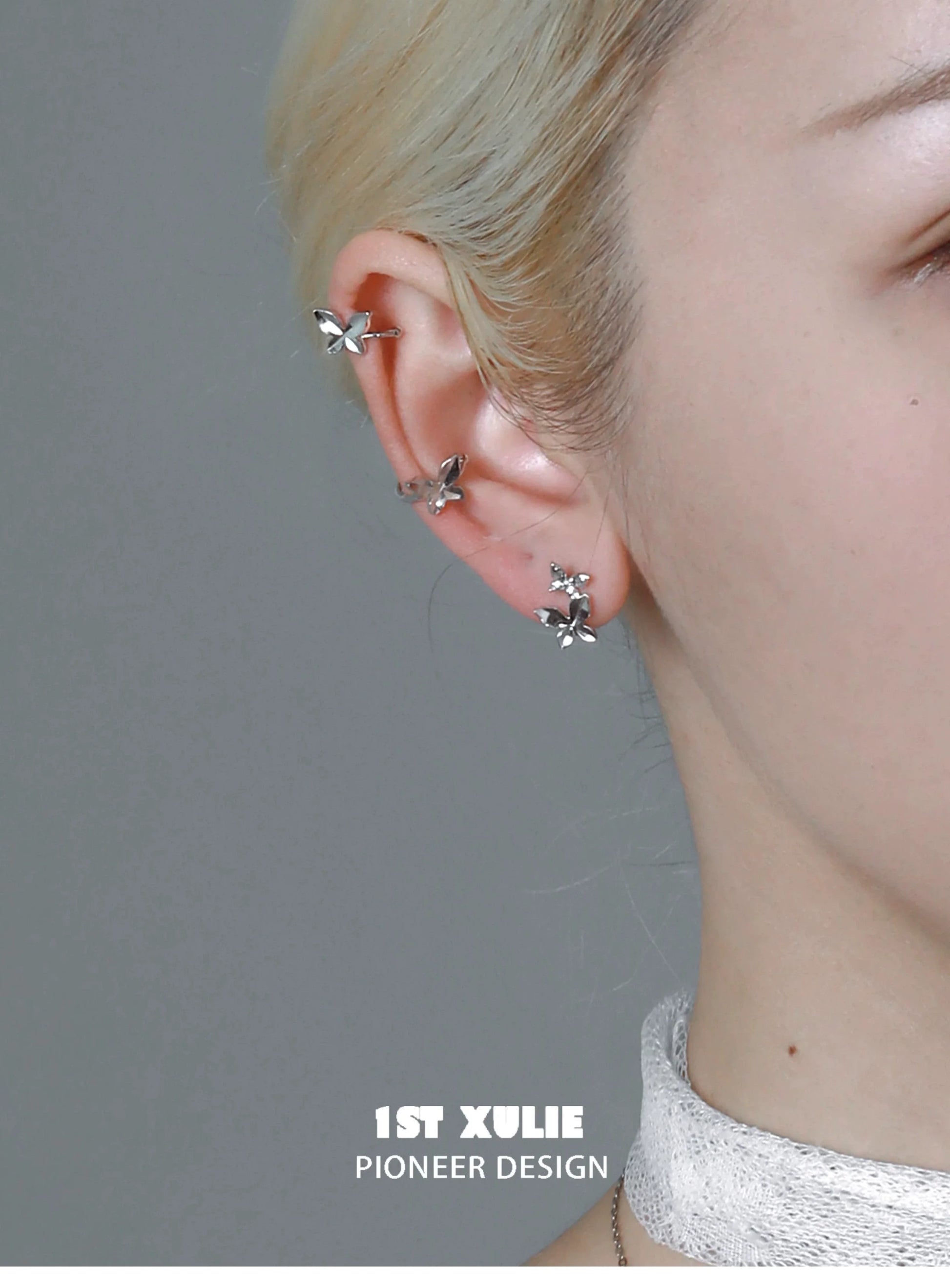 Elegant butterfly silver ear cuff designed for a stylish look with multiple butterfly accents