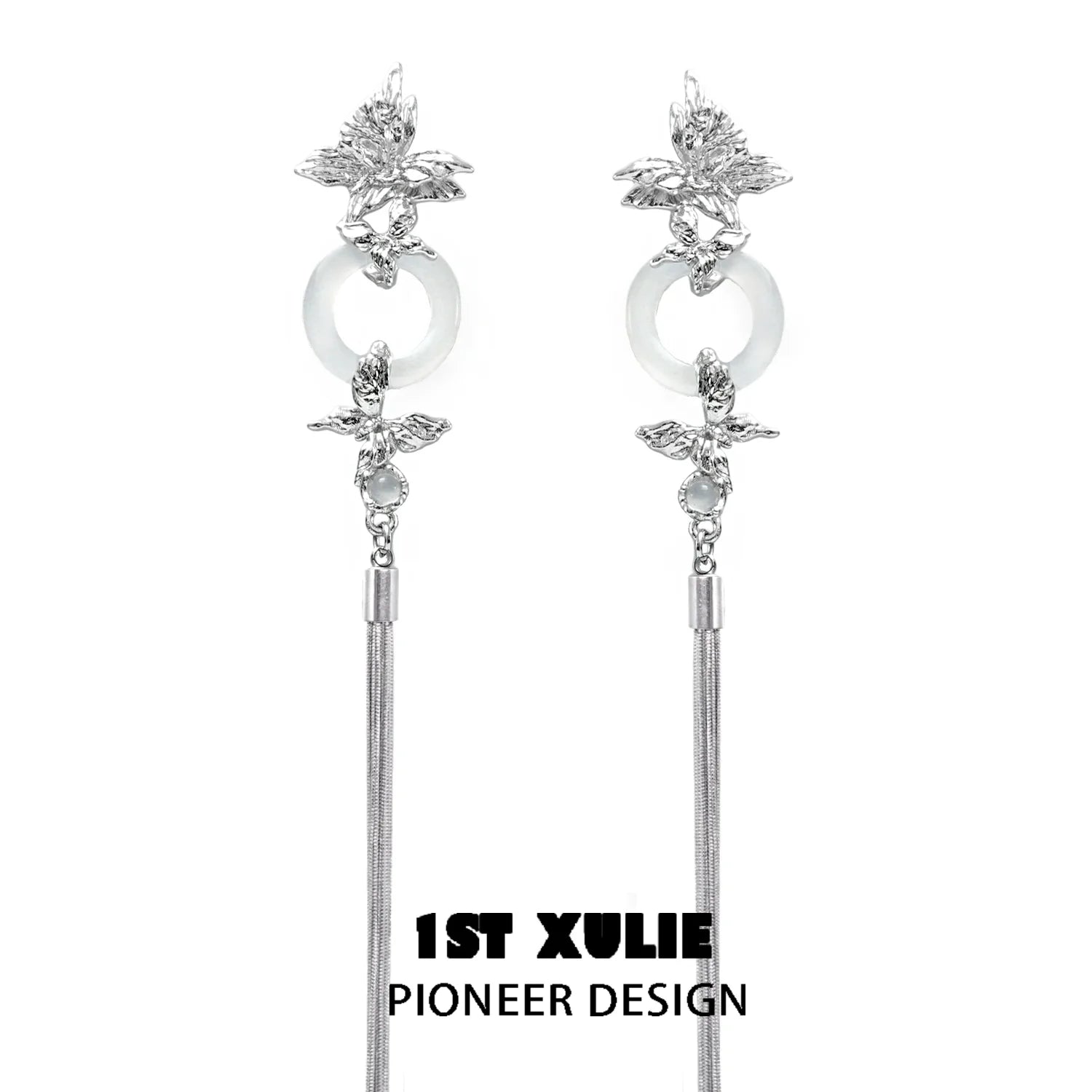 Elegant butterfly tassel earrings with silver accents and stylish design by 1ST XULIE