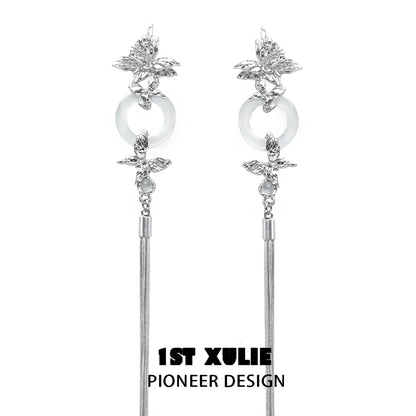 Elegant butterfly tassel earrings with silver accents and stylish design by 1ST XULIE