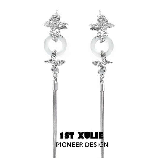 Elegant butterfly tassel earrings with silver accents and stylish design by 1ST XULIE