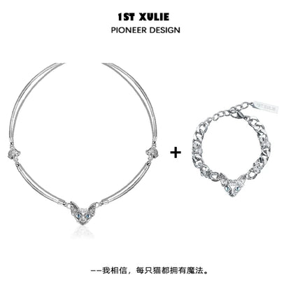 Elegant 1ST XULIE cat clavicle necklace with heart pendant and matching bracelet for stylish outfits