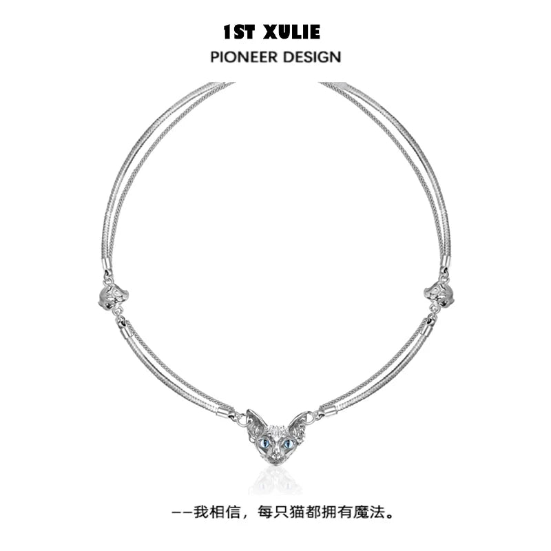 Elegant silver cat clavicle necklace featuring a sparkling cat pendant with blue eyes