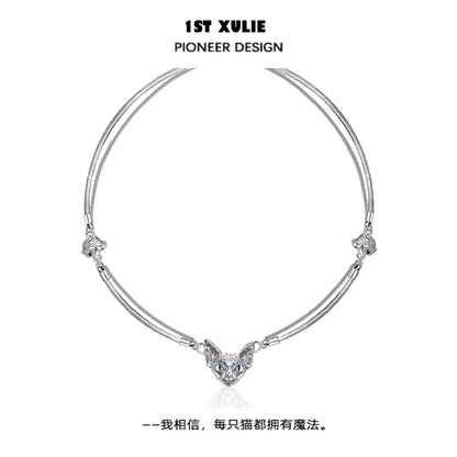 Elegant silver cat clavicle necklace featuring a sparkling cat pendant with blue eyes