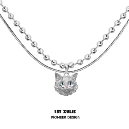 1ST XULIE Cat Crown Necklace featuring a silver cat head pendant with blue eyes on dual chains
