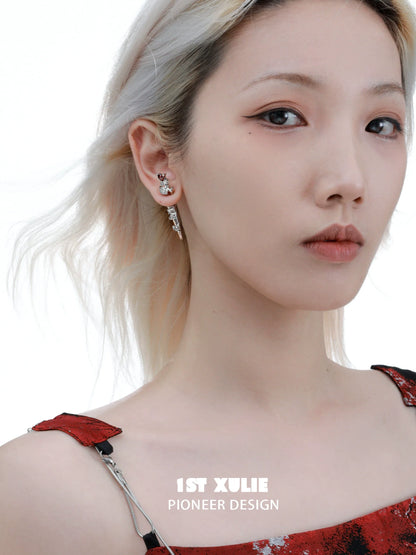 Model wearing 1ST XULIE cathedral rose piercing earrings for a stylish accessory look