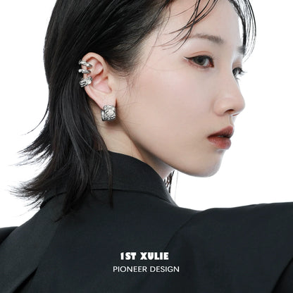 Model wearing 1STXULIE celestial agate ear clip with an elegant hairstyle and stylish attire