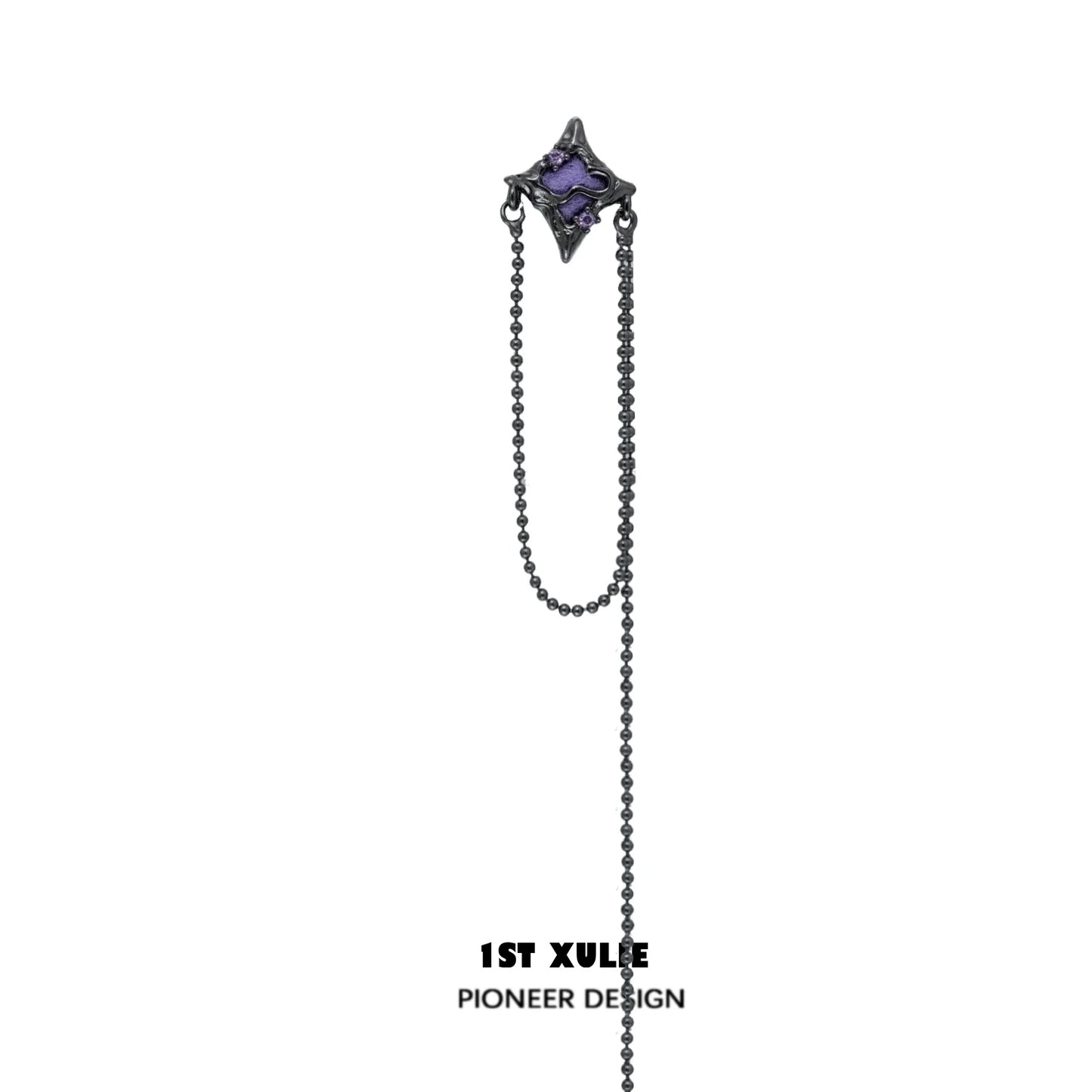 Unique celestial ear cuff jewelry in black with a chain and purple gemstone detail
