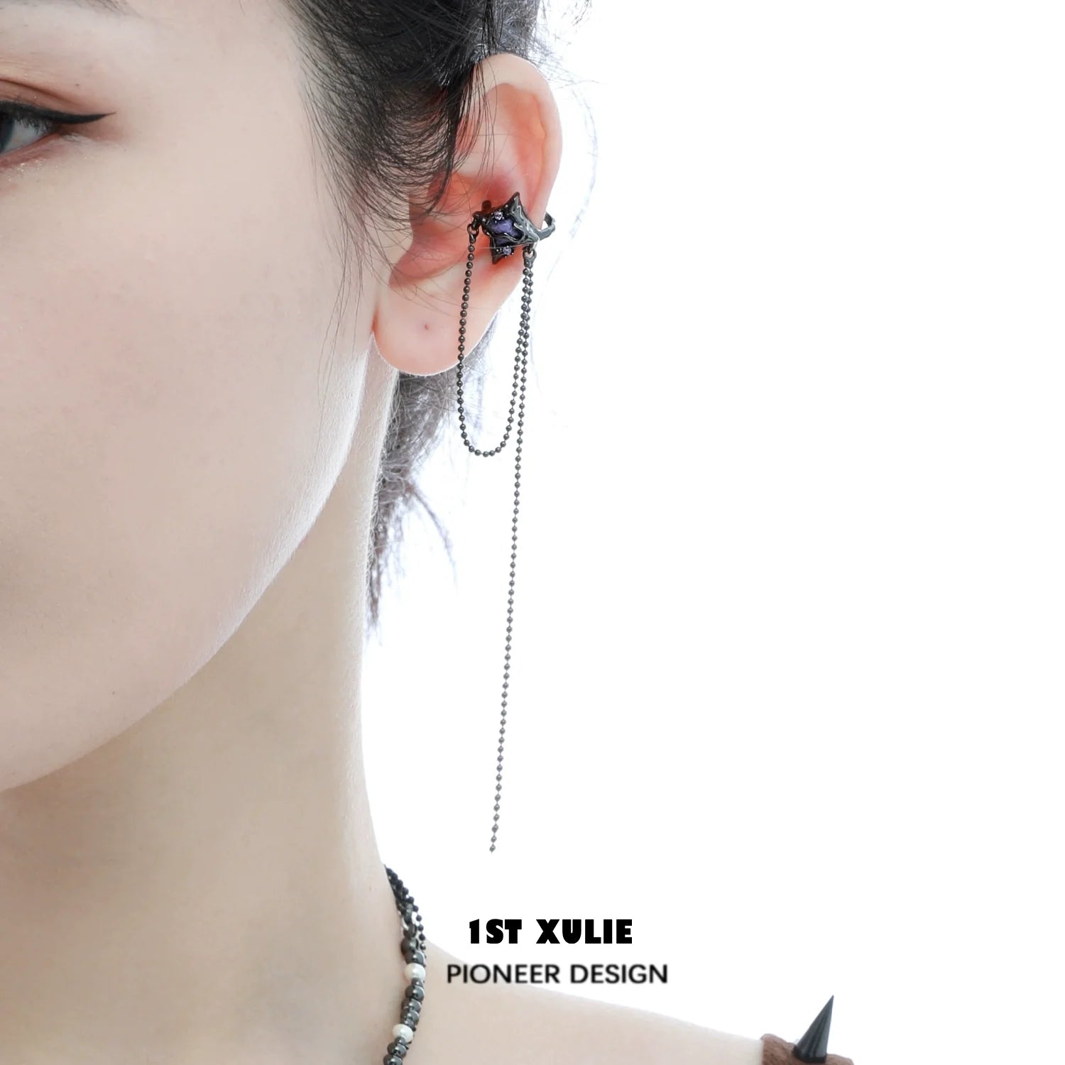 Stylish celestial ear cuff jewelry featuring a unique design with a delicate chain for a trendy look