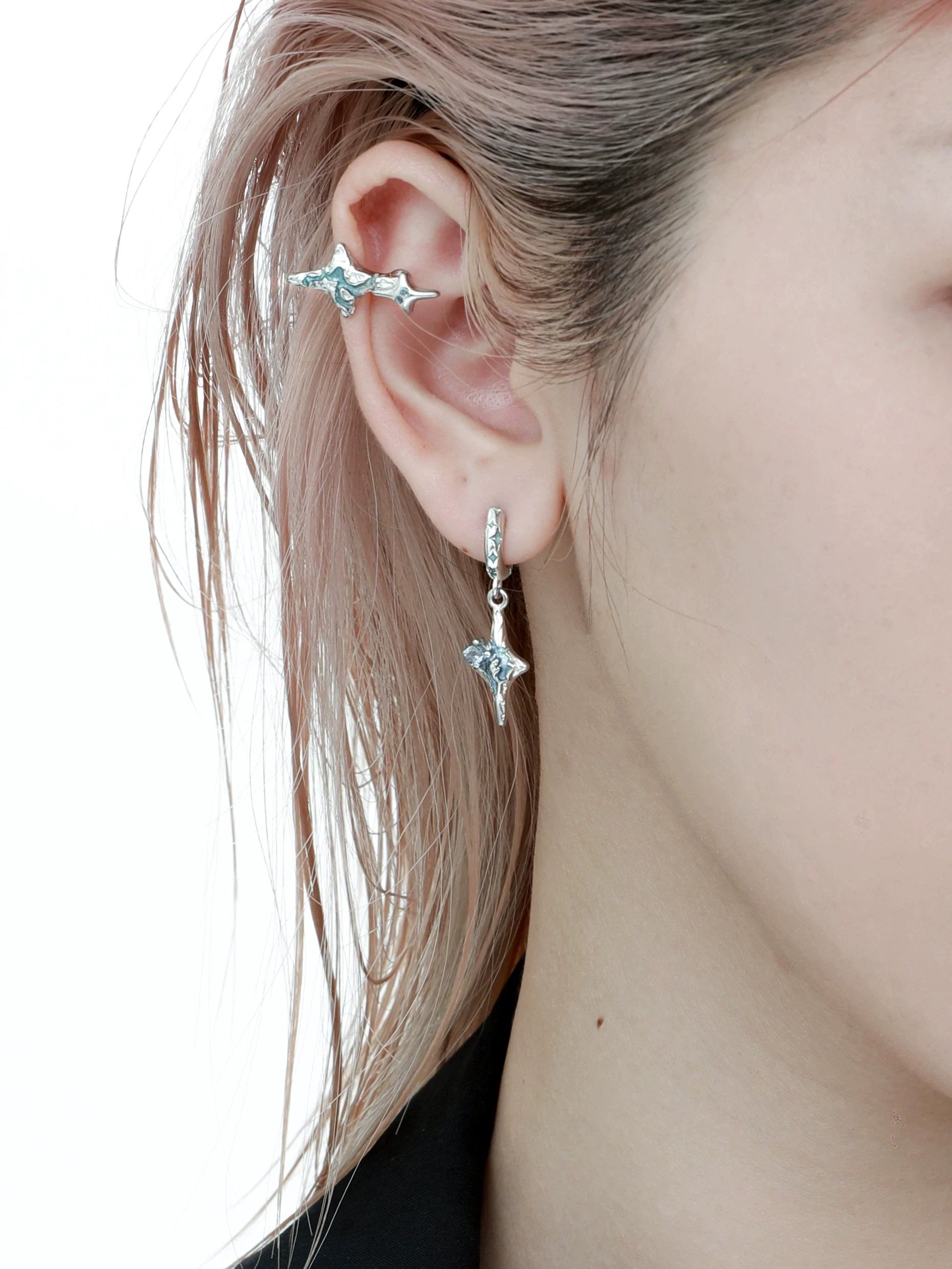 Elegant celestial sea star earrings in silver, featuring a delicate design perfect for ocean lovers