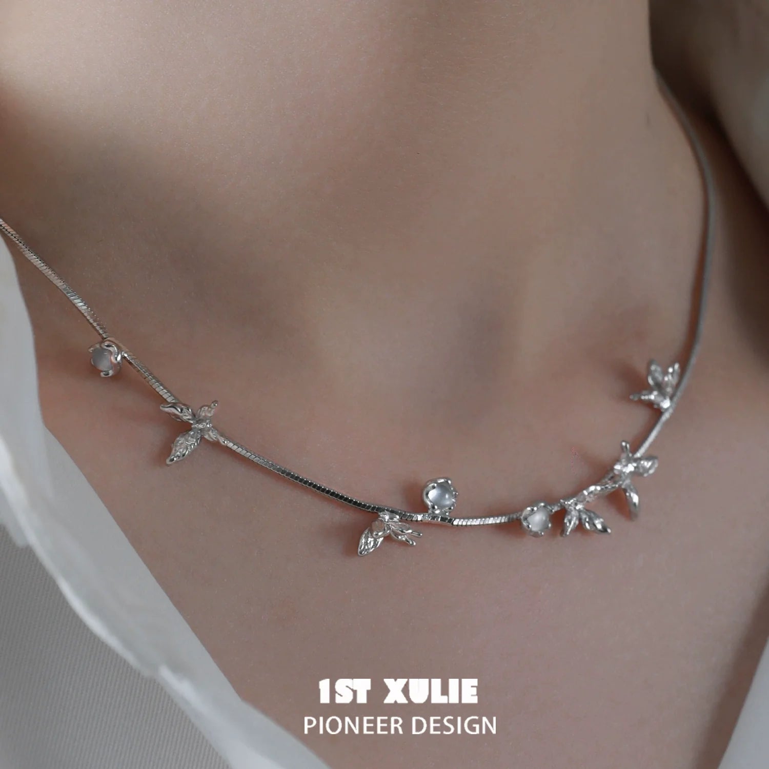 Elegant chalcedony butterfly necklace by 1STXULIE with delicate silver detailing