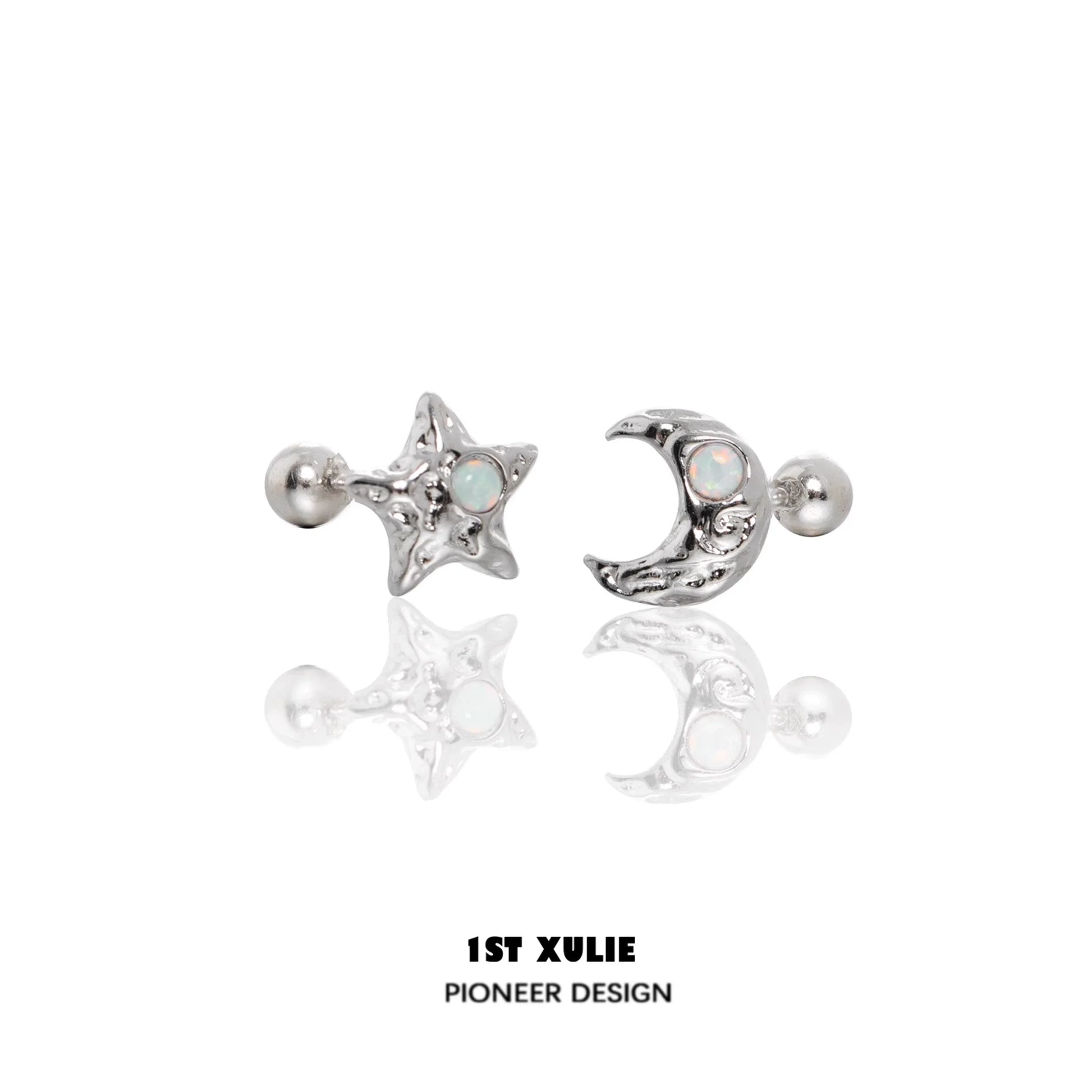 Silver cosmic moon and star earrings with opal details for a celestial-inspired look