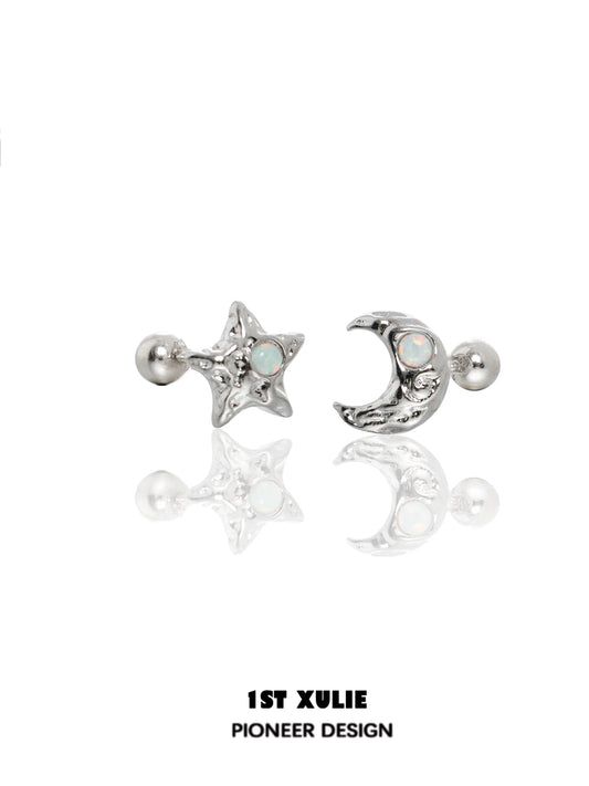 Silver cosmic moon and star earrings with iridescent details for a celestial look