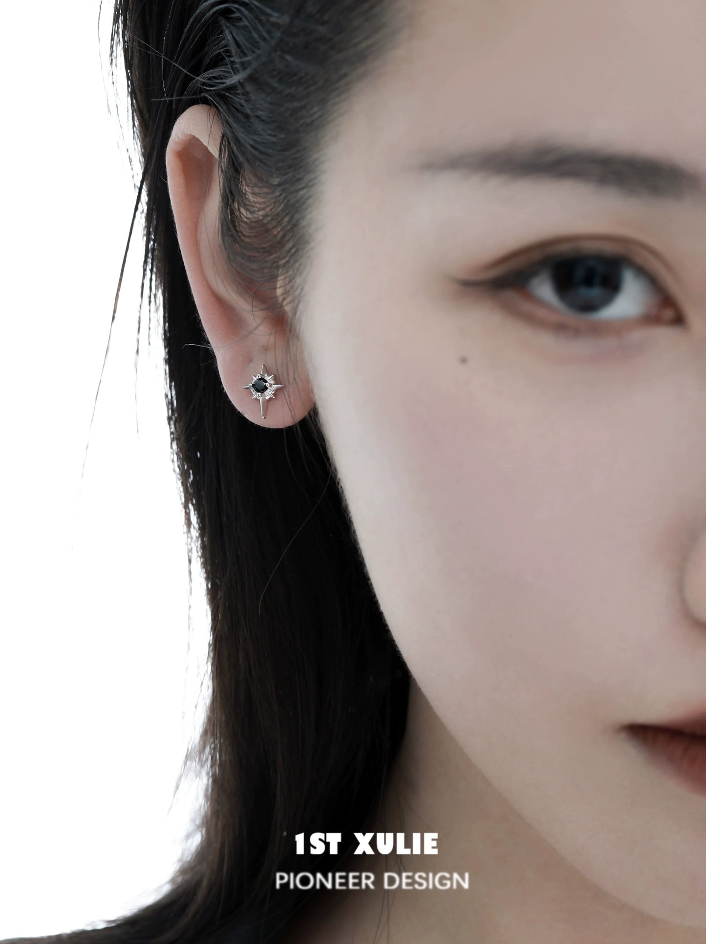 Chic model wearing 1STXULIE cosmic star earrings that add a stylish touch to any outfit