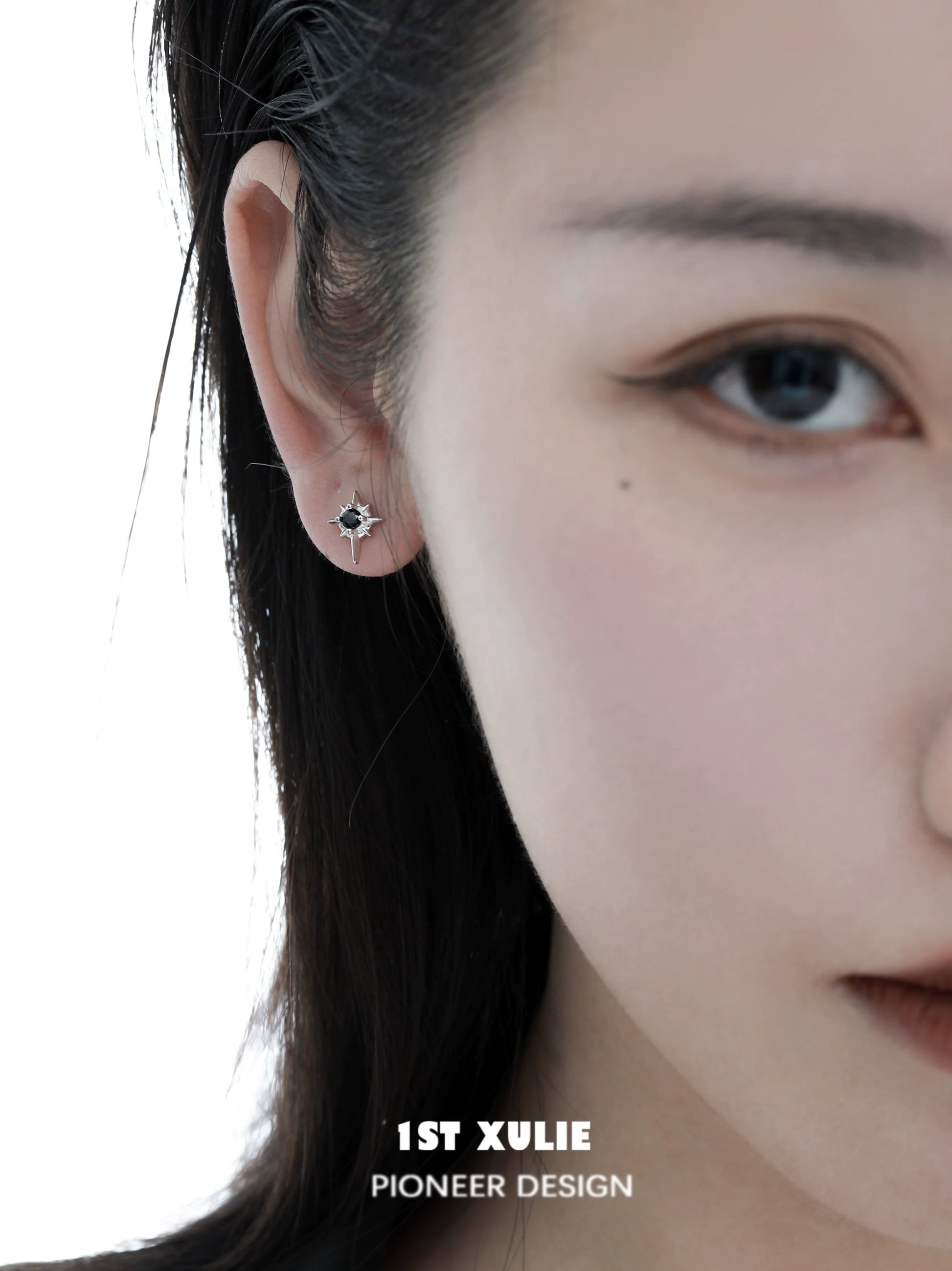 Chic model wearing 1STXULIE cosmic star earrings that add a stylish touch to any outfit