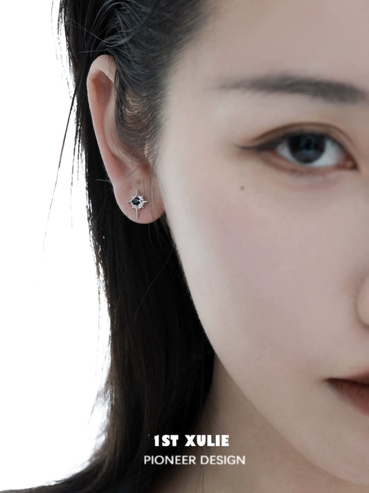 Chic model wearing 1STXULIE cosmic star earrings that add a stylish touch to any outfit