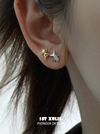 Cosmic star earrings in gold and silver designs featuring shimmering gemstones for a stylish look
