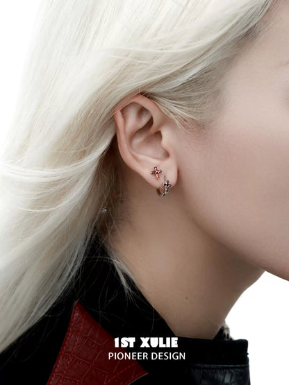 Elegant Crimson Cross Gothic Earrings showcased on a model with stylish blonde hair