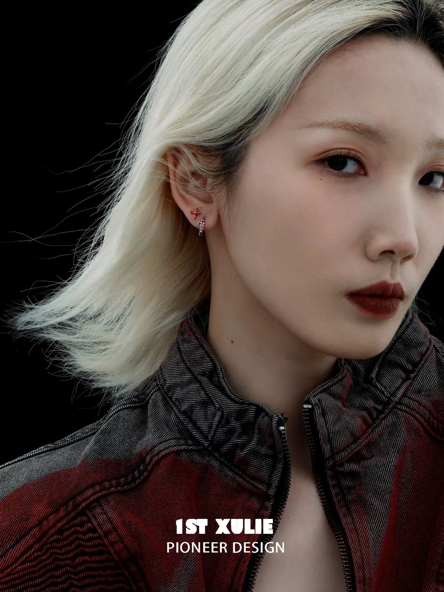 Model wearing 1ST XULIE crimson cross gothic earrings that feature a unique design and enhance any outfit