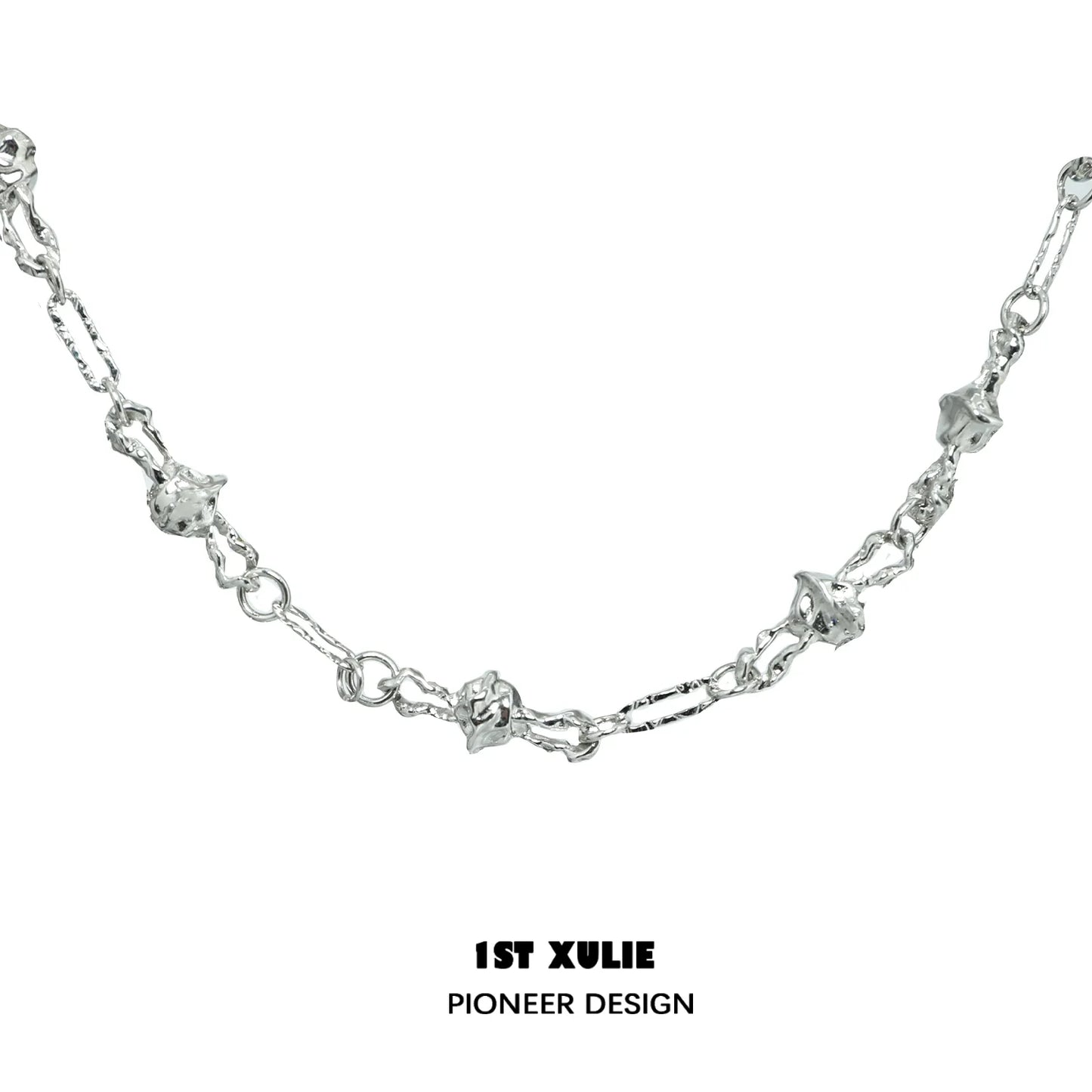 Silver crowned cat necklace designed with intricate links and elegant charm details