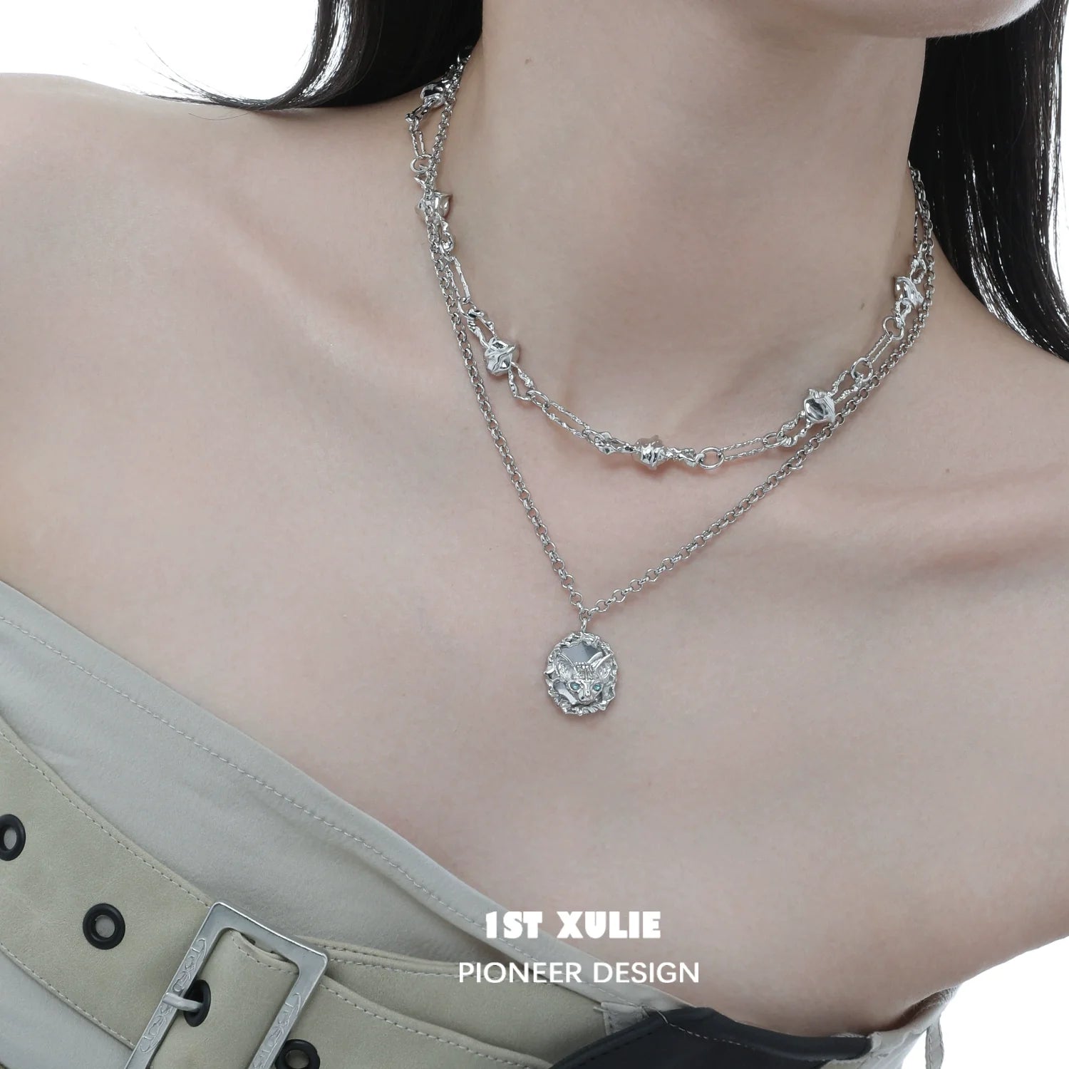 Elegant crowned cat necklace layered with silver chains for a stylish accessory look