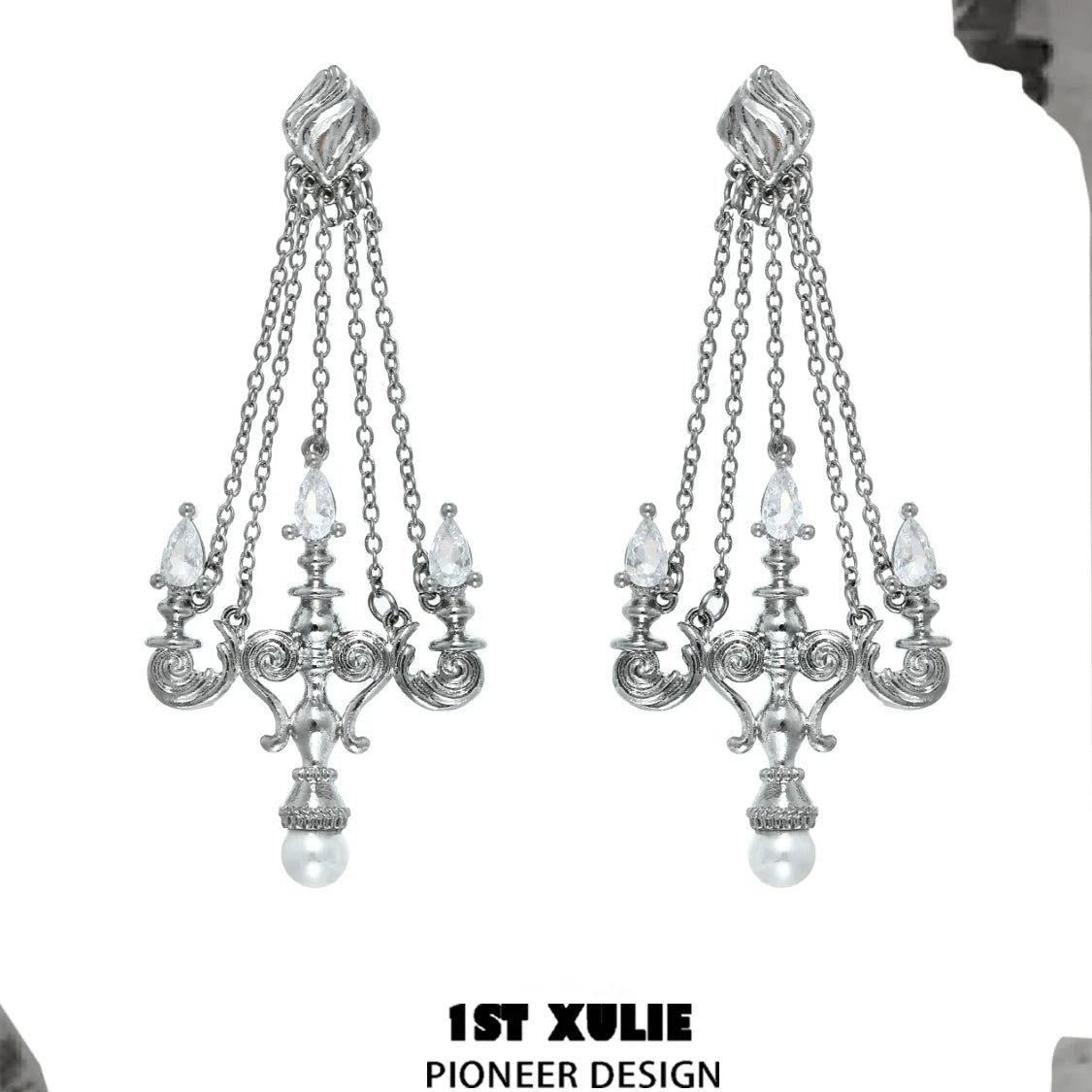 Elegant silver crystal lamp earrings with cascading chains and pearl accents for a stunning look