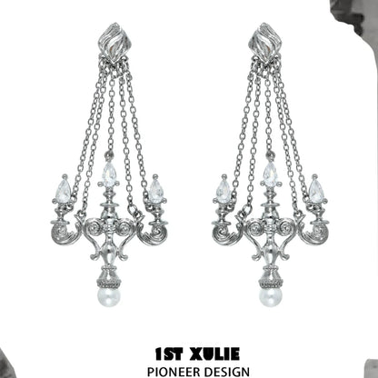 Elegant silver crystal lamp earrings with cascading chains and pearl accents for a stunning look