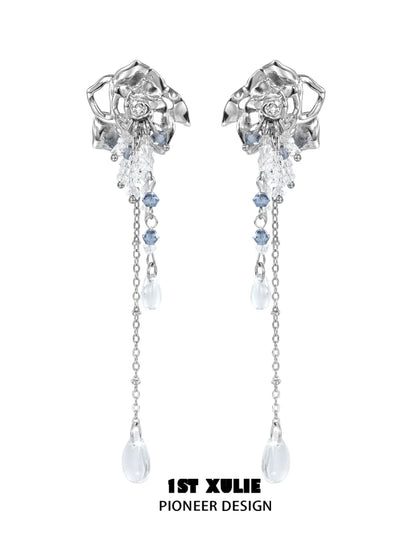 Elegant crystal rose tassel earrings featuring silver and blue accents for a stunning look