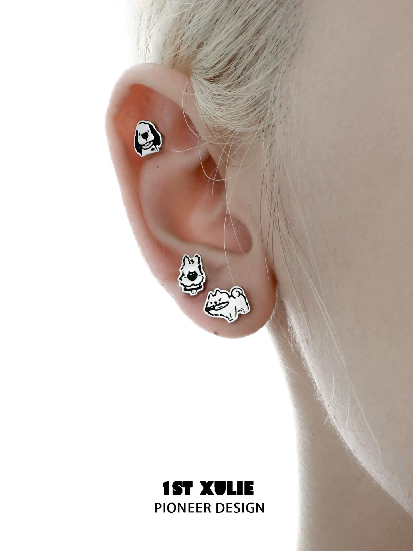 Cute puppy earrings featuring playful designs of dogs in various poses by 1STXULIE