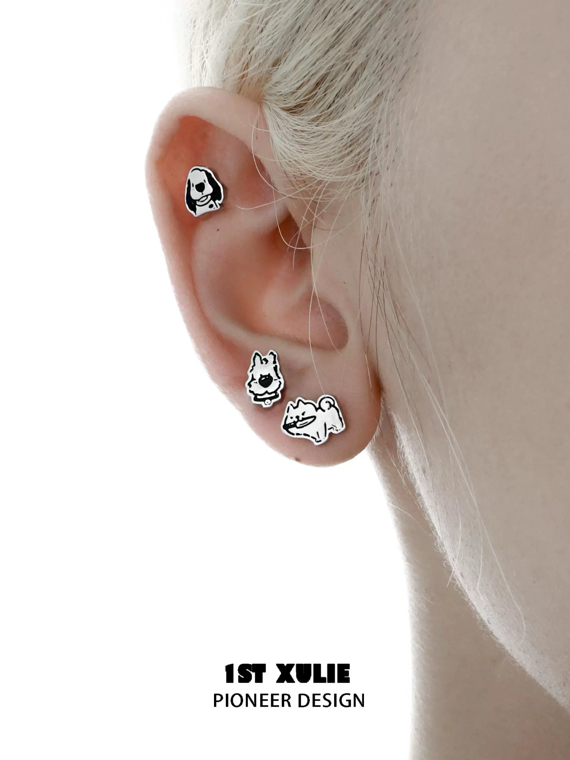 Cute puppy earrings featuring playful designs of dogs in various poses by 1STXULIE