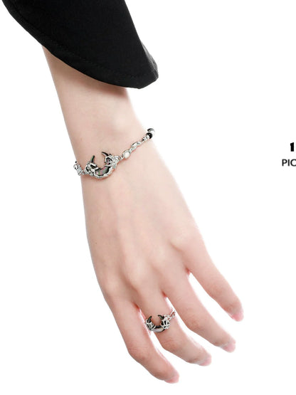 Elegant dark moon agate bracelet with a unique design showcased on a model's wrist