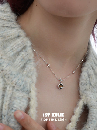 1ST XULIE Desert Planet Necklace featuring a celestial design with stars and a unique pendant