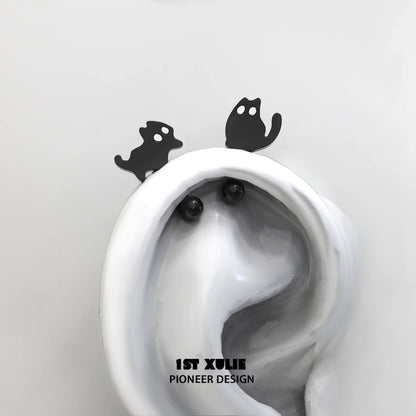 Devil cat earrings by 1STXULIE featuring playful black cat designs with unique ear shapes